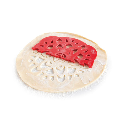 Talisman Designs Pie Top Cutter roll-and-cut technique in action for even patterns