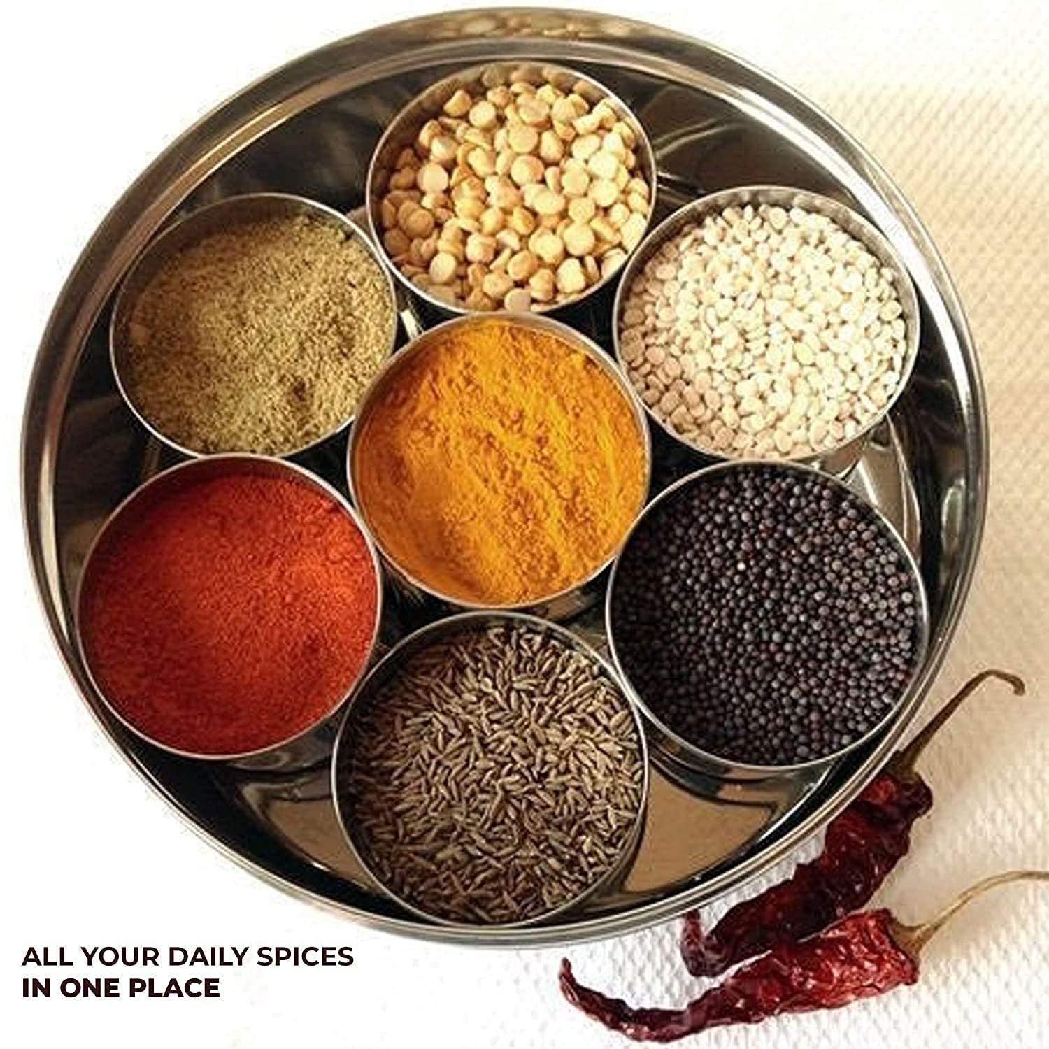 Taluka spice box fits an 8x8 inch counter space for compact kitchens.