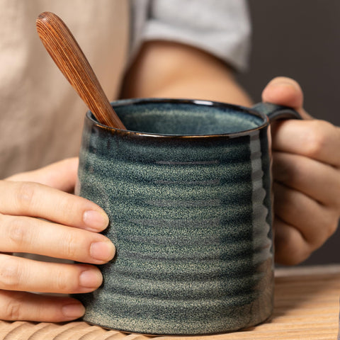 TaoTaojarvie mug features transmutation glaze yielding unique color patterns.
