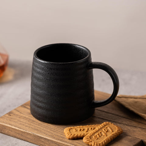 TaoTaojarvie mug handle closeup highlights comfortable grip.