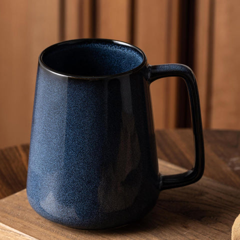 TaoTaojarvie table decoration idea featuring starry blue mug at a party setting.