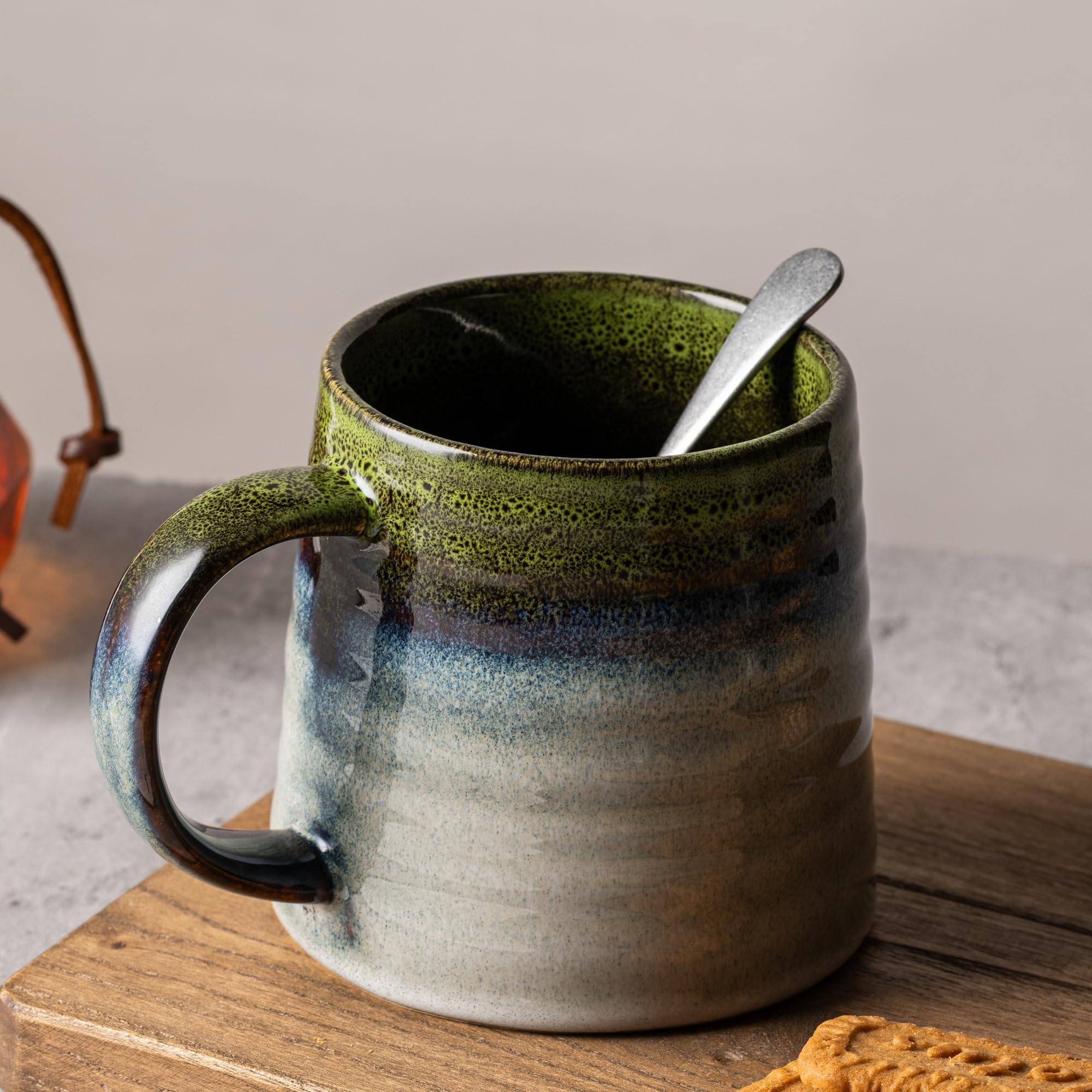 TaoTaojarvie transmutation glaze mug shows unique kiln-fired color patterns