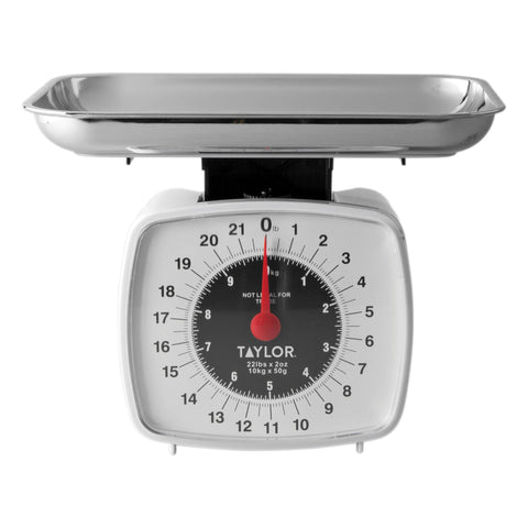 Taylor analog kitchen scale dial close-up for quick, accurate readings.