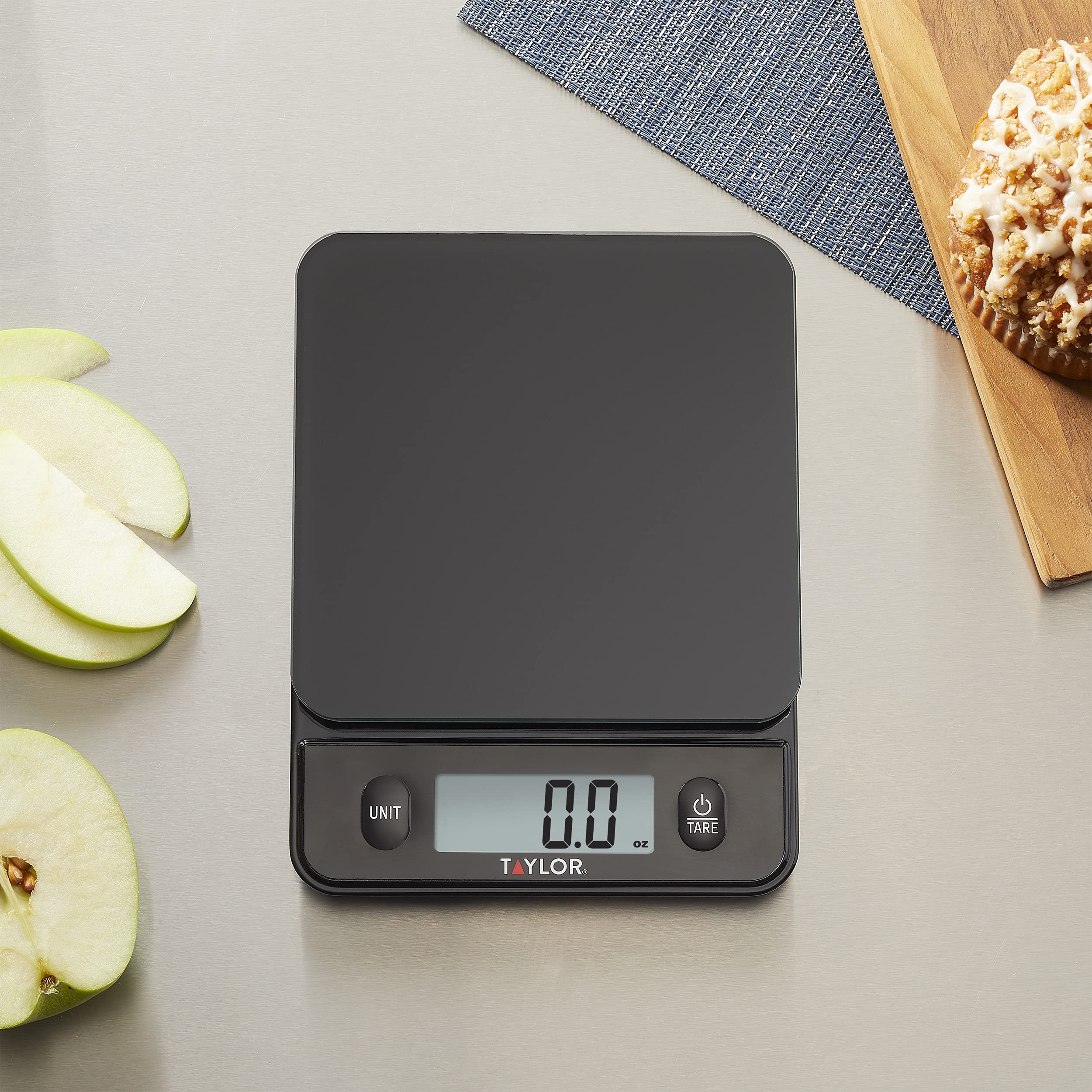 Taylor Glass Top Scale compact design fits under cabinets in a modern kitchen