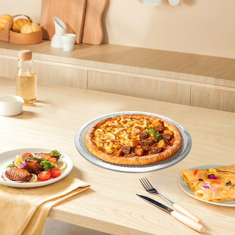 tchrules perforated bottom close-up promoting even heating and crispy crust