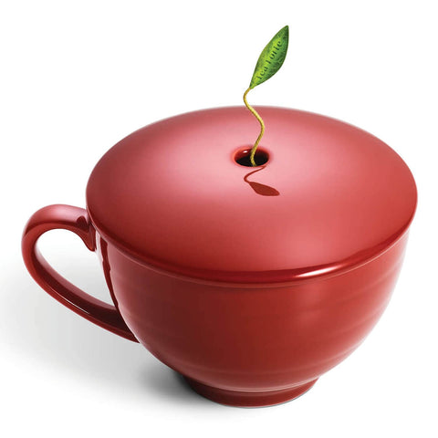 Steeping lid with hole reveals pyramid infuser leaf for mindful brewing