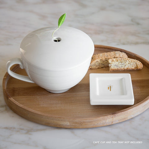 Tea Forte natural bamboo tray for simple wipe-clean care and quick drying.