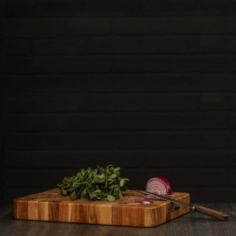 Teakhaus cutting board showing juice groove for collected drips