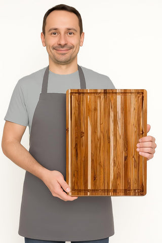 Teakhaus reversible board doubles prep surface for versatile cooking sessions.