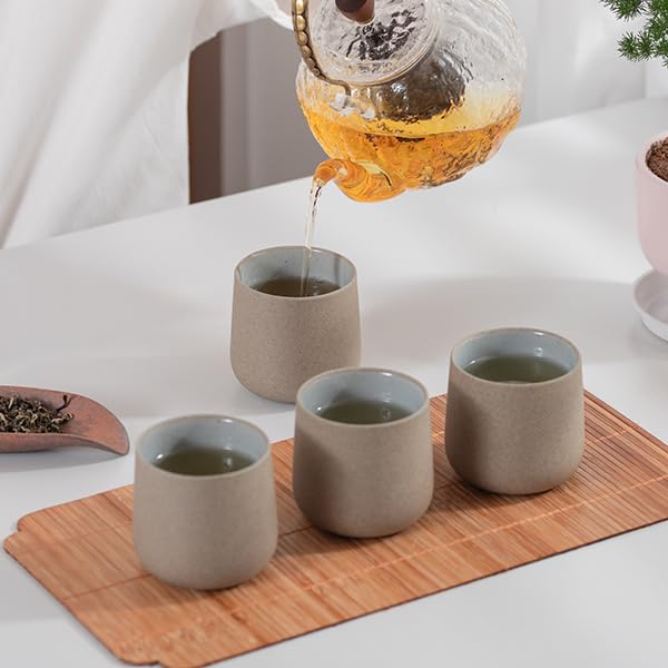 Dark-grey ceramic finish complements modern table settings and traditional matcha rituals.