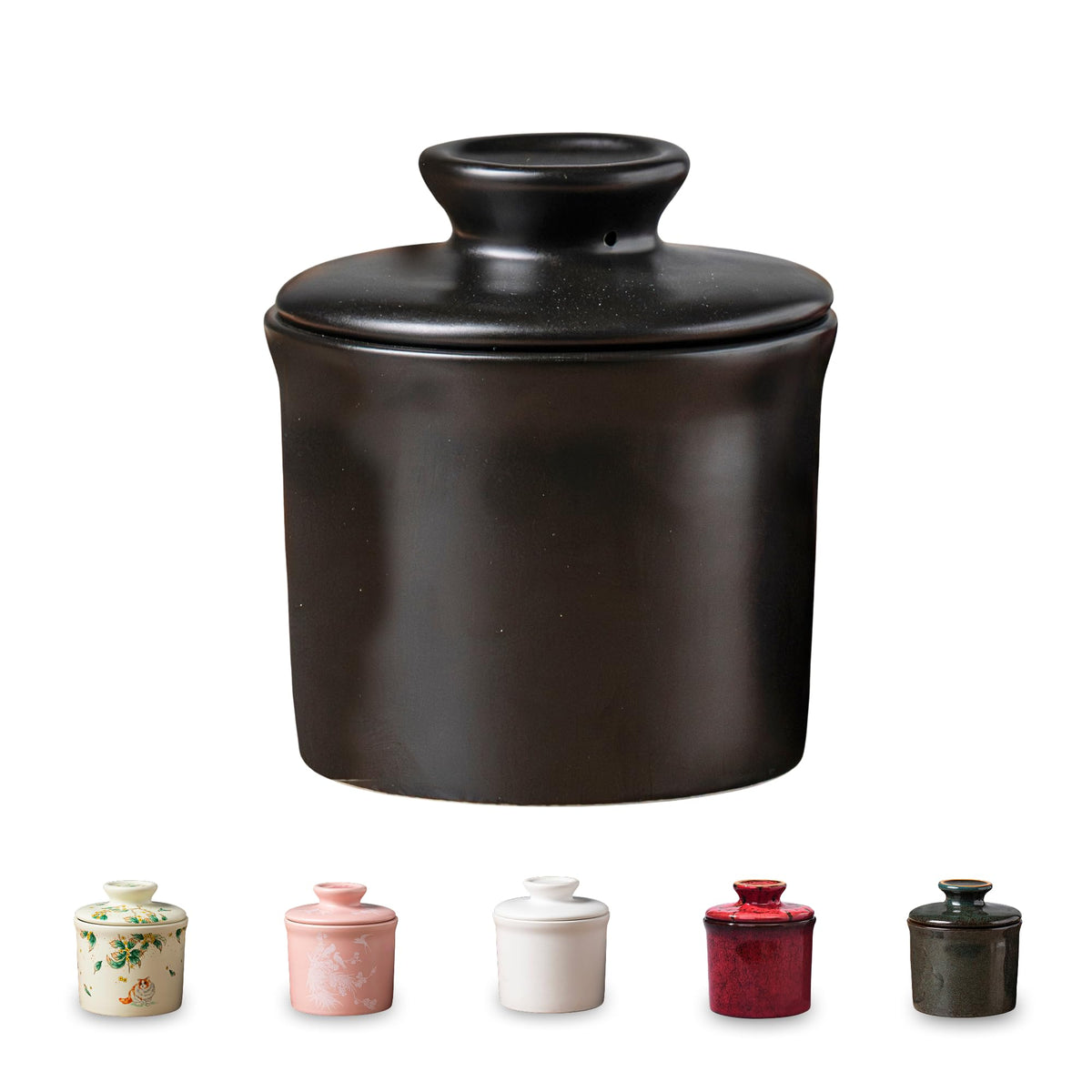 Teapeak porcelain butter crock with lid on countertop preserves freshness.