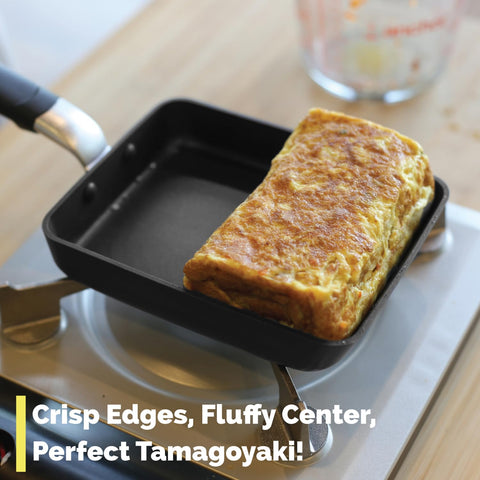 TECHEF Tamagoyaki pan flipping omelette demonstrating roll-ready design