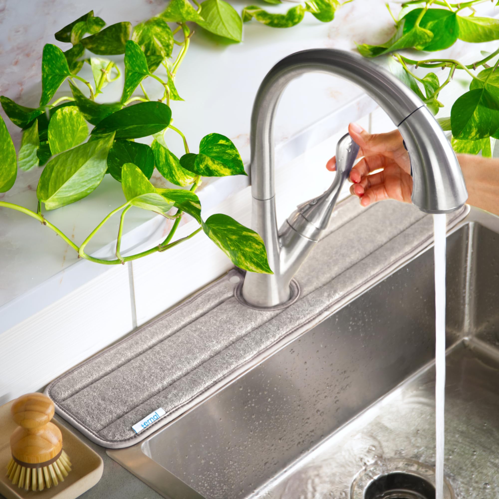 Ternal Sinkmat drying mat supports air-drying of towels and utensils near the sink.