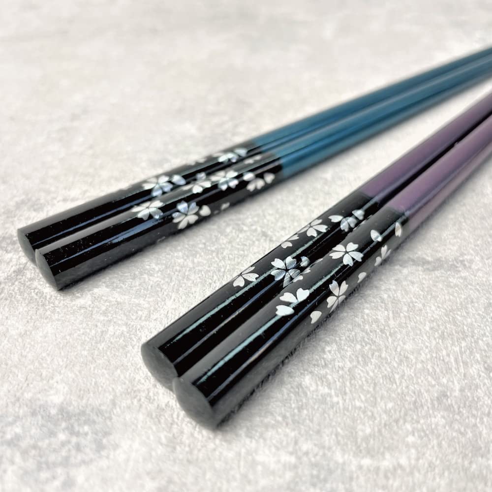 Terra Distribution cherry blossom lacquer design chopsticks ideal for elegant dining.