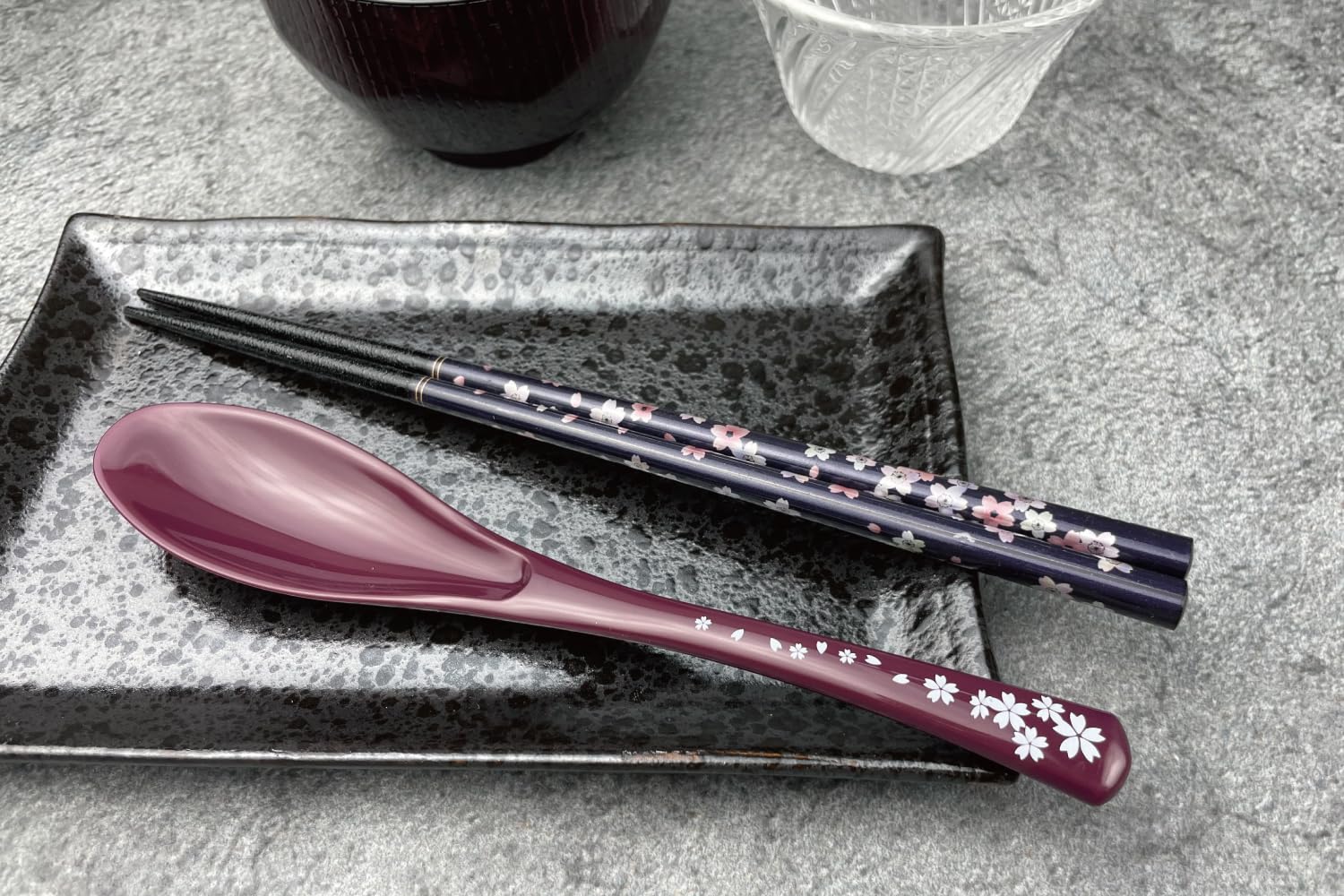 Terra Distribution chopsticks and spoon on table setting, ideal for sushi nights