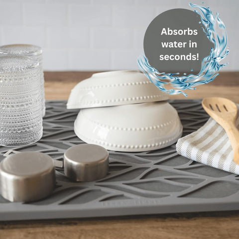 Terra + Timber stone mat suits produce and baby bottles.