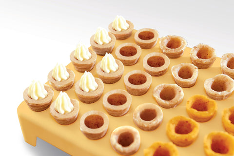 Tescoma Beehive cookie shapes formed before baking reveal detail.