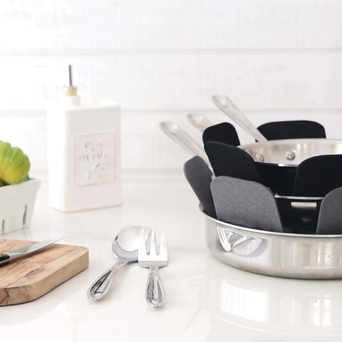 T-Fal premium protector 18-inch closeup highlights sturdy polyester adapting to cookware sizes.