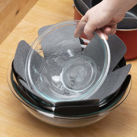 T-Fal premium protector 18-inch guard guards big pots from slipping and scratching during storage.