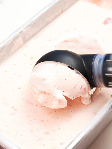 That! Inventions ScoopTHAT Radii warming ice cream scoop with a redesigned head for bigger, rounder scoops.