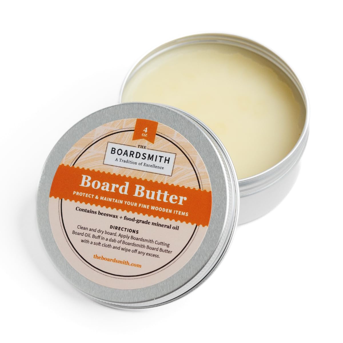 The Boardsmith Cutting Board Butter jar on a wooden counter provides easy wood conditioning.