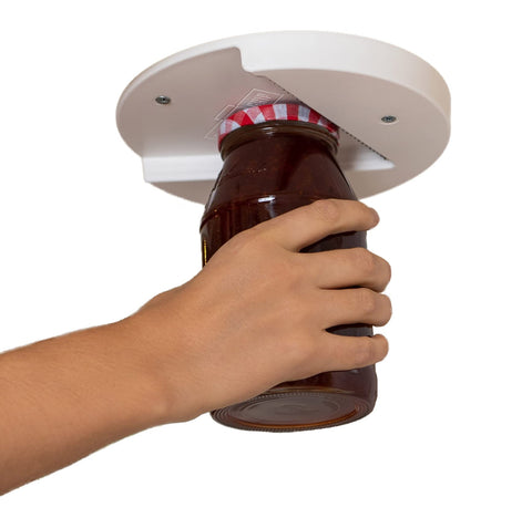 THE G GRIP mounted under-cabinet jar opener in kitchen for easy lid access