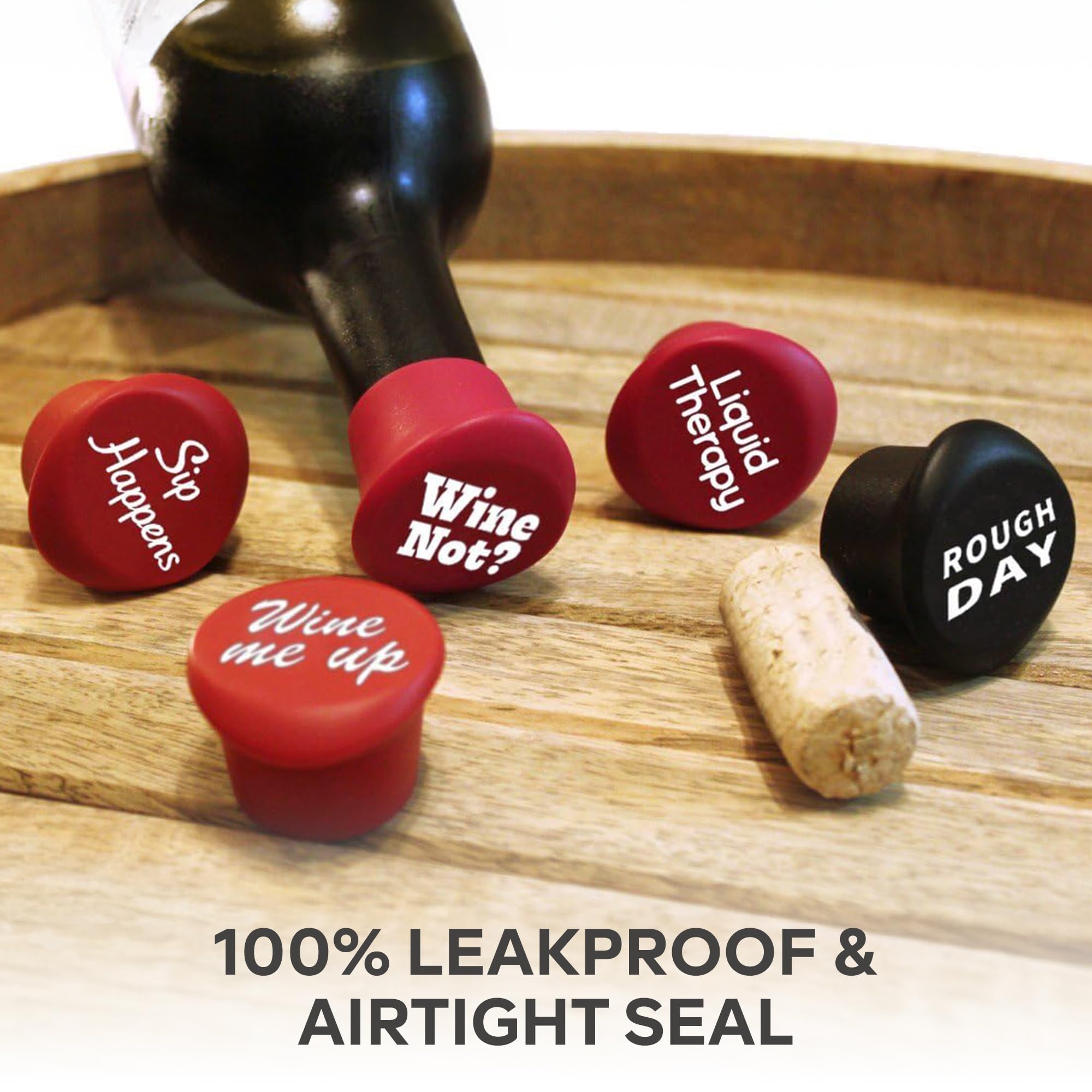 The ONLY GIFT WORTH GIVING silicone stopper close-up shows witty phrases for wine nights.
