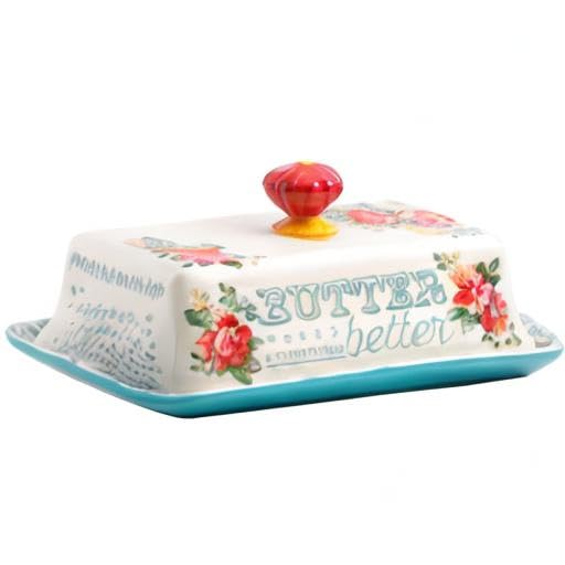 The Pioneer Woman vintage floral butter dish lid sits securely for table serving.