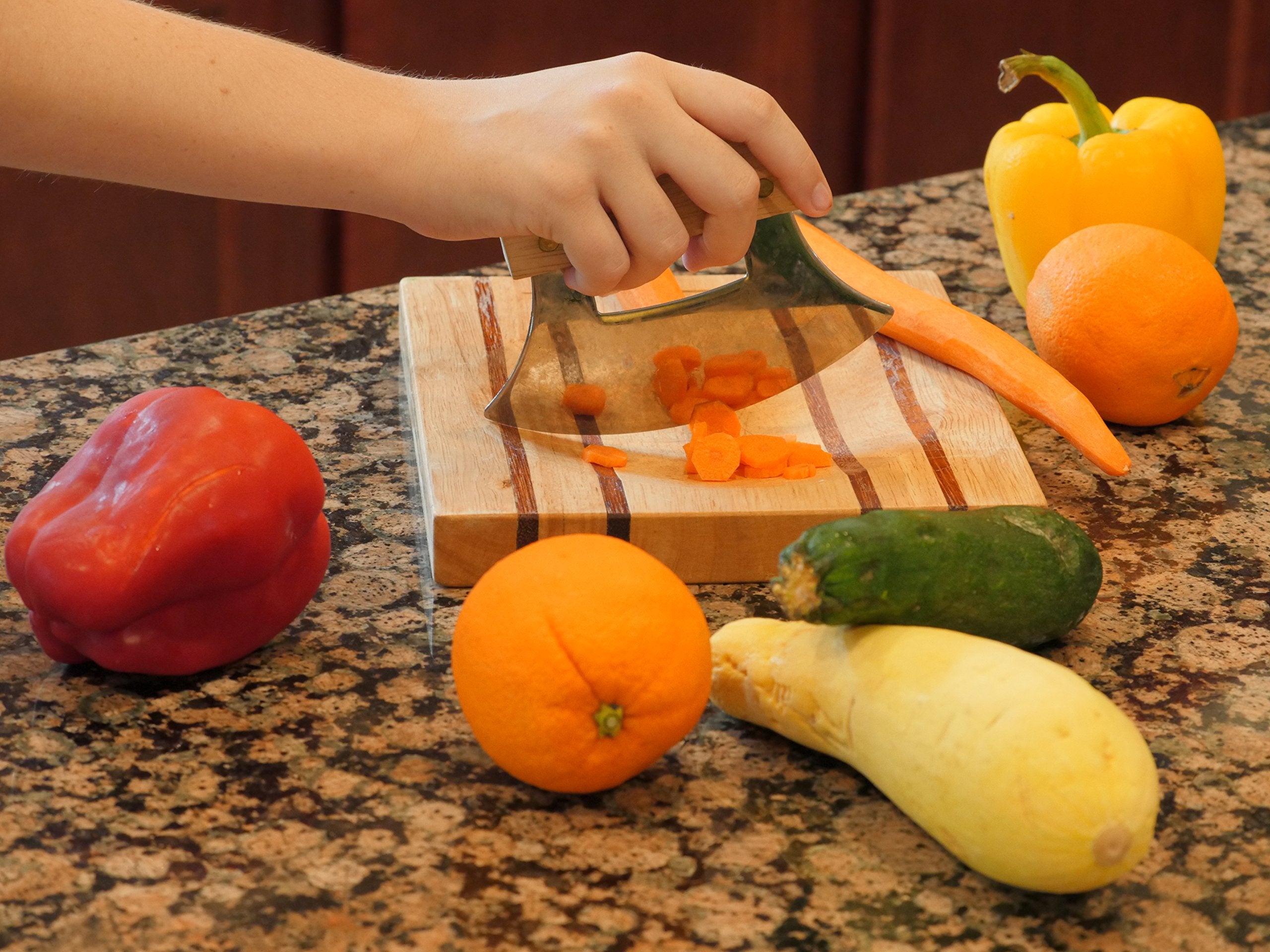 The ULU Factory knife stand keeps the blade safely stored and accessible.