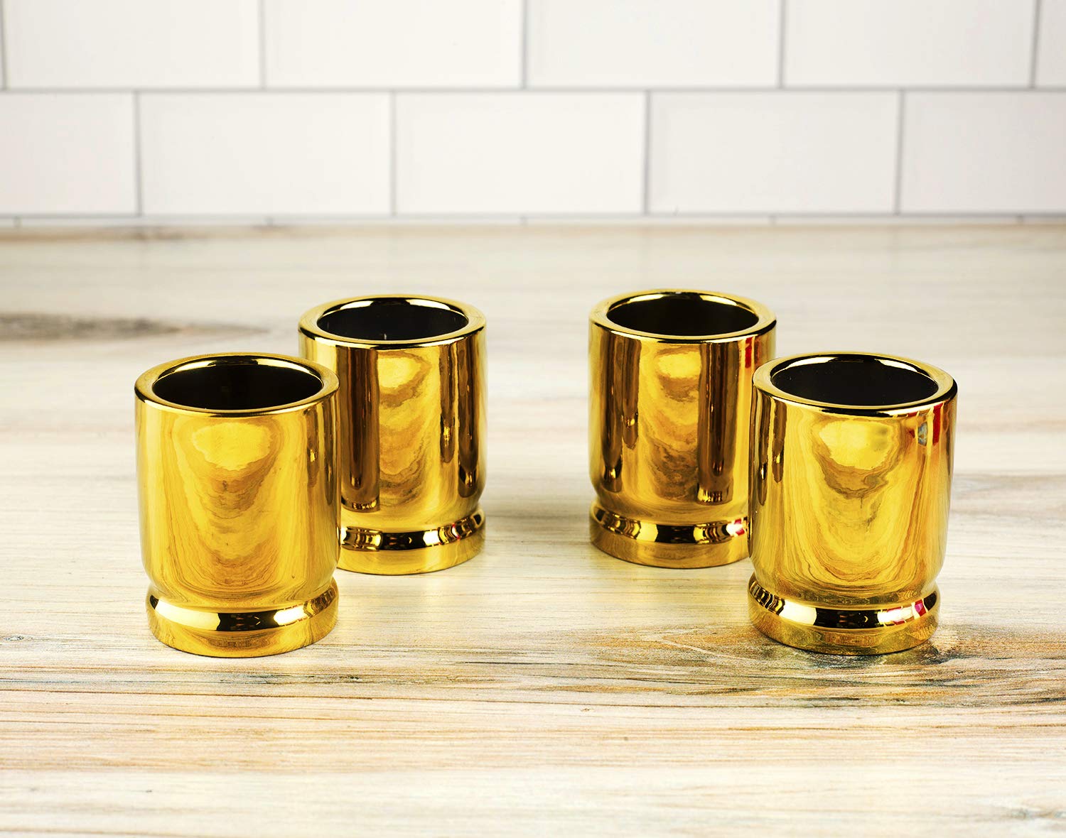 The Wine Savant bullet shot glasses highlight 2-ounce capacity with rugged bullet casing design.