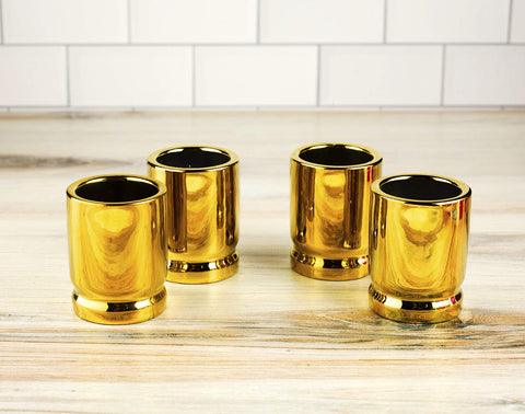 The Wine Savant bullet shot glasses highlight 2-ounce capacity with rugged bullet casing design.
