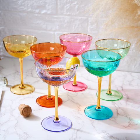 The Wine Savant hand-blown colored coupe glasses for vibrant cocktails and celebrations.