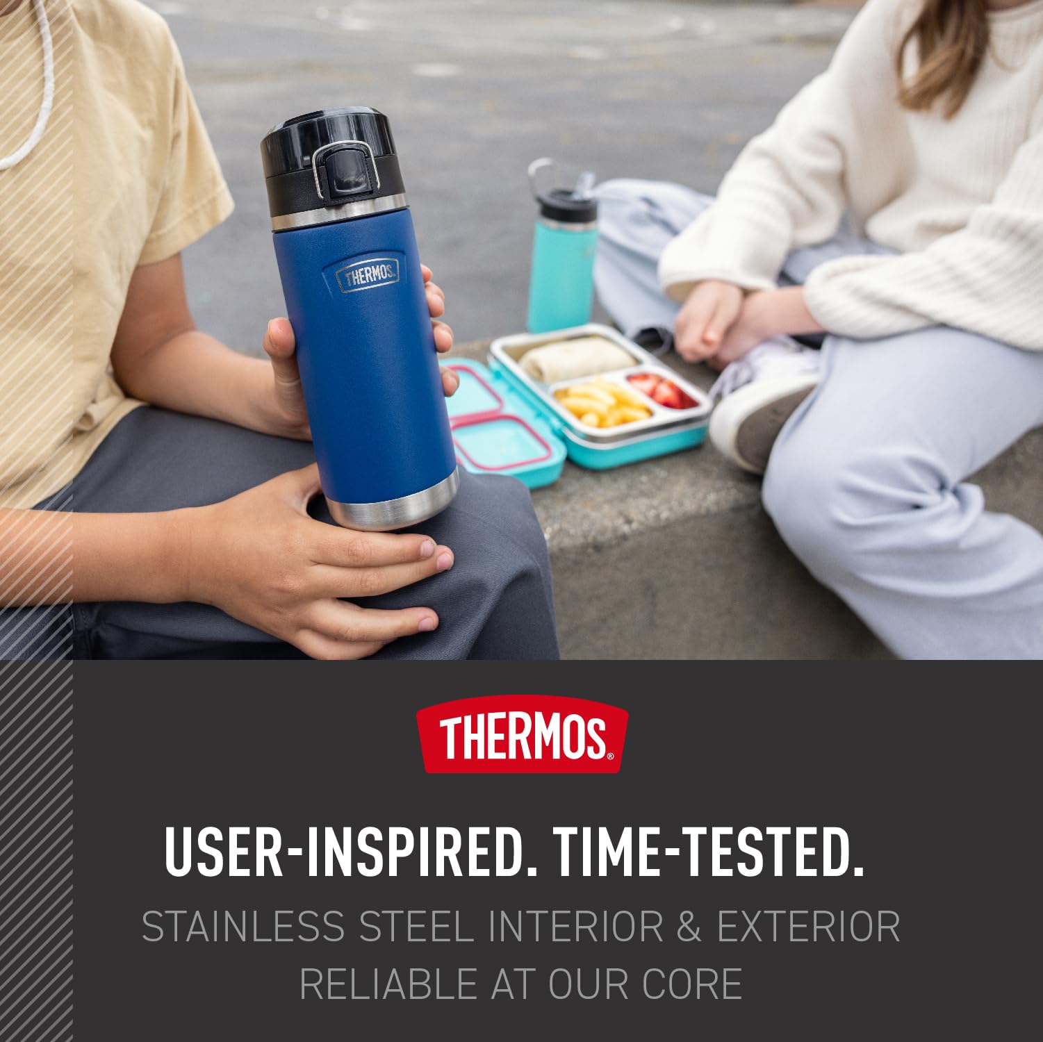 THERMOS ICON SERIES 18oz dark teal bottle held in hand