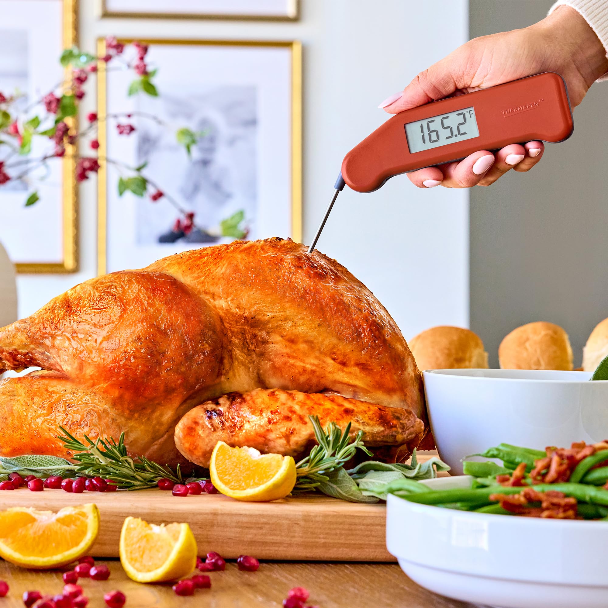 ThermoWorks Thermapen Nautical Blue in use near a hot pan for quick checks