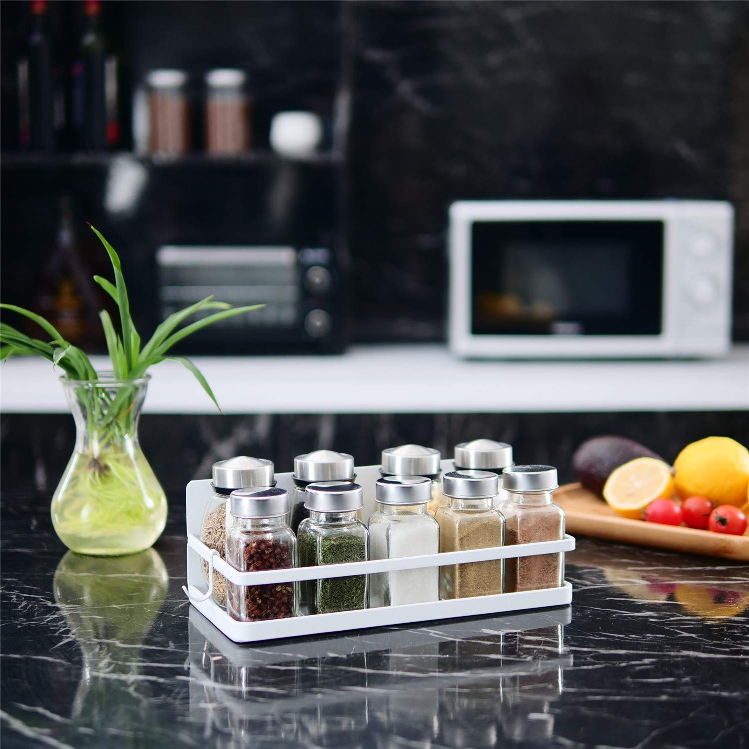 Thipoten magnetic shelf attached to fridge or microwave stores jars securely.