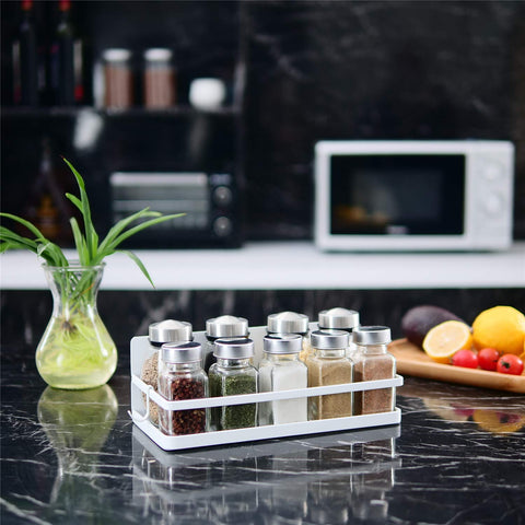 Thipoten magnetic shelf attached to fridge or microwave stores jars securely.