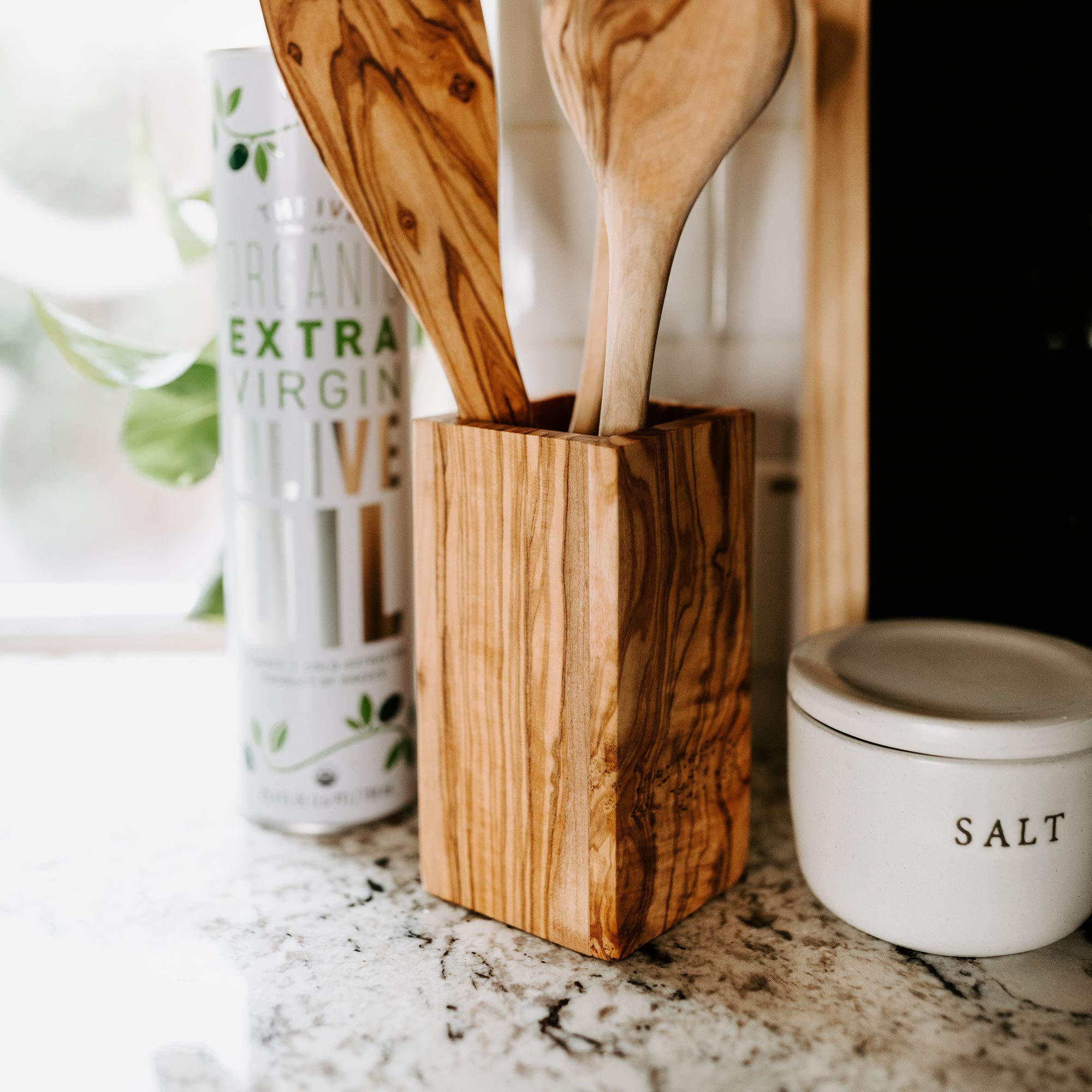 Thirteen Chefs olive wood crock offers durable storage for everyday utensils.