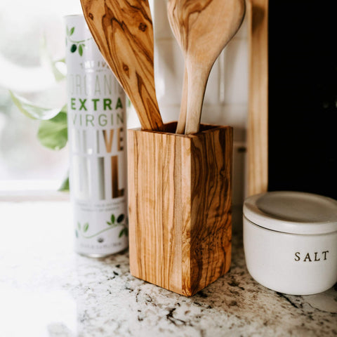 Thirteen Chefs olive wood crock offers durable storage for everyday utensils.
