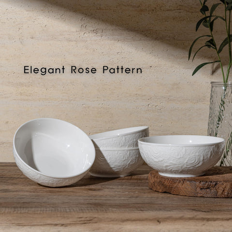 THRYVONA white embossed bowls with rose detail provide grip and elegance.