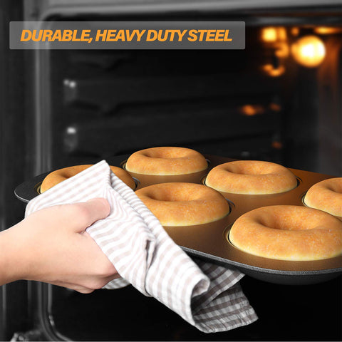 Donuts cooling with glaze on the Tiawudi pan indicating even browning.