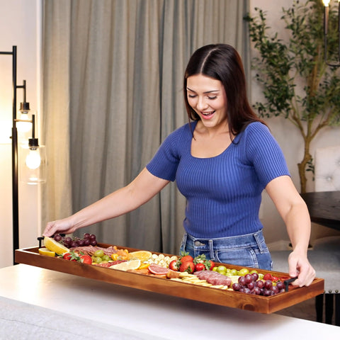 Top view of a ready-to-serve Tidita board with cheeses and fruits