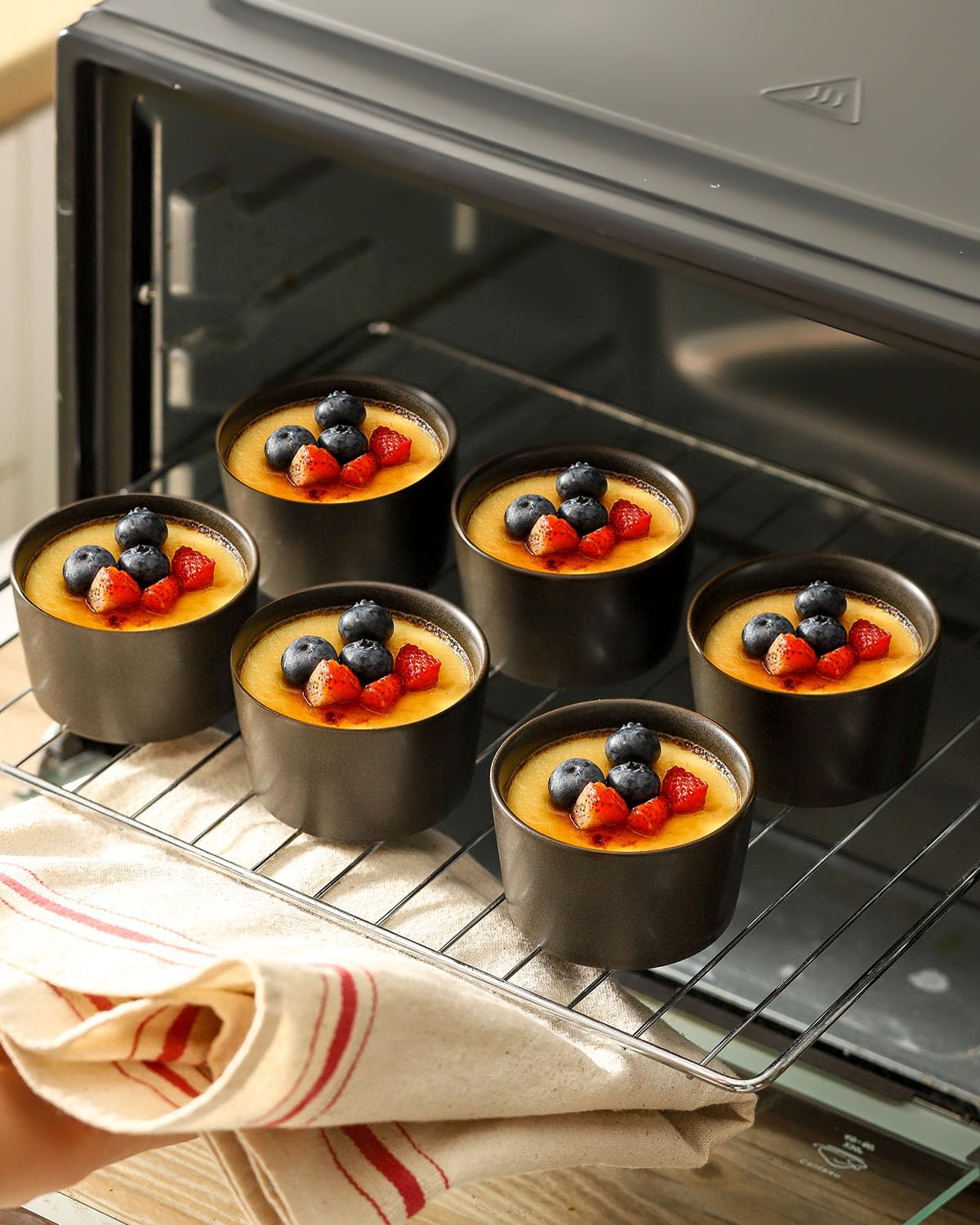 Tikooere stackable ceramic ramekins save cabinet space and organize portions.