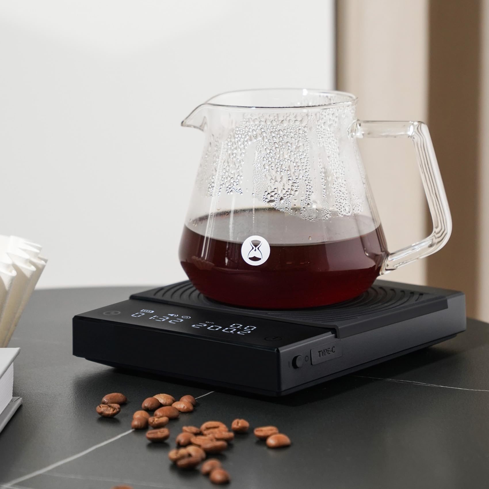 TIMEMORE Coffee Scale Basic 2.0 held in hand for portable precision