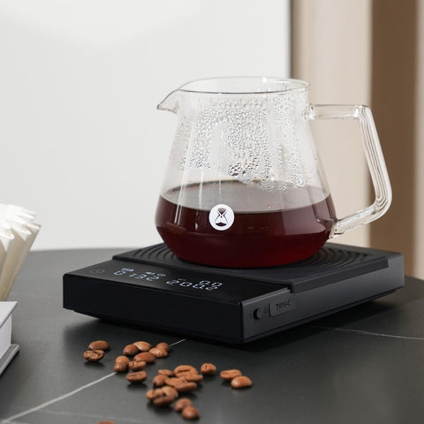 TIMEMORE Coffee Scale Basic 2.0 held in hand for portable precision