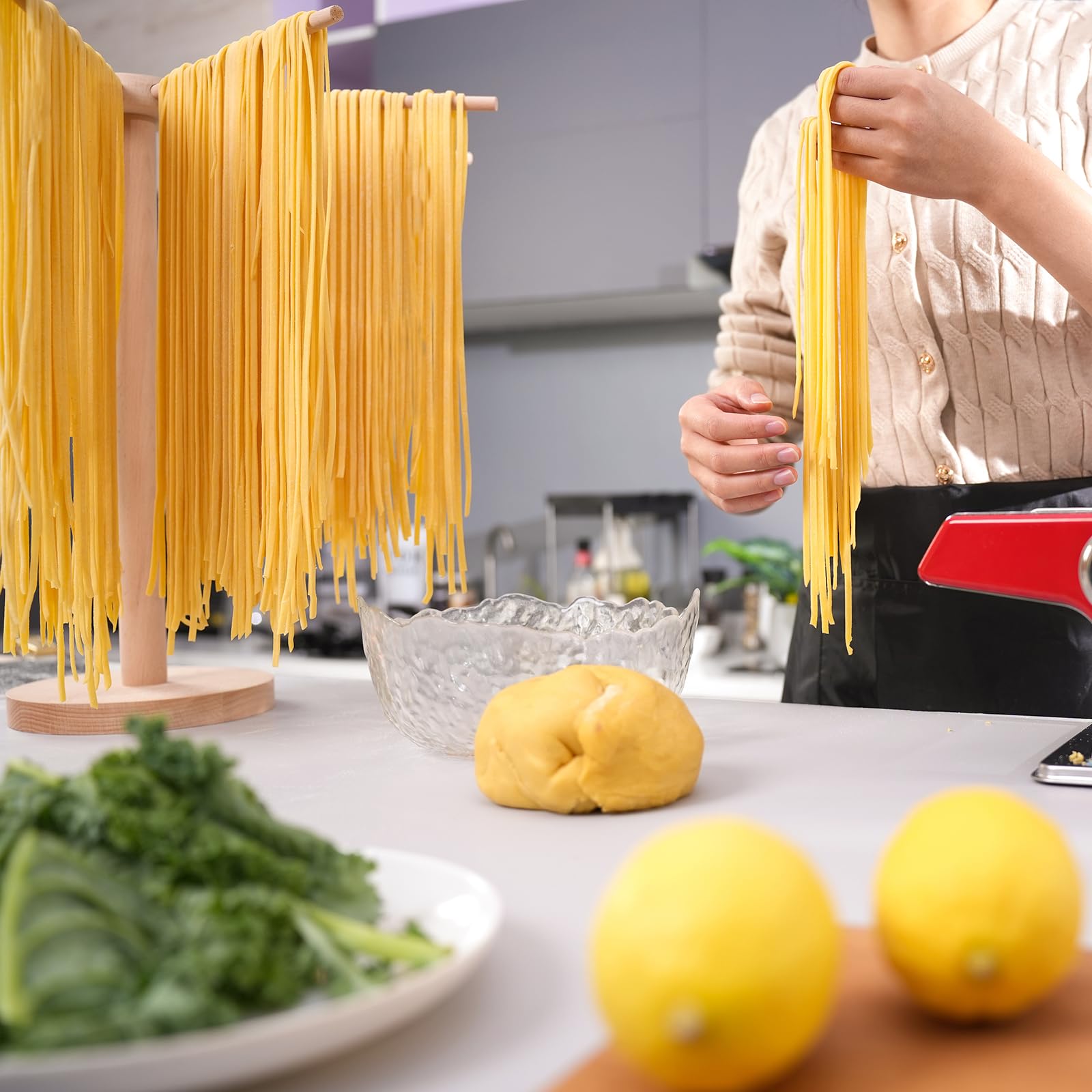 Tinada pasta rack on the kitchen counter makes drying noodles convenient during meal prep.