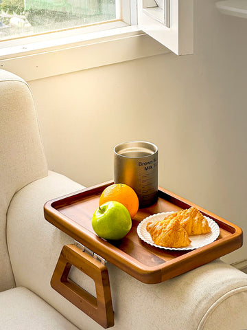 Tinamo acacia arm table with wide-leg support for stability.