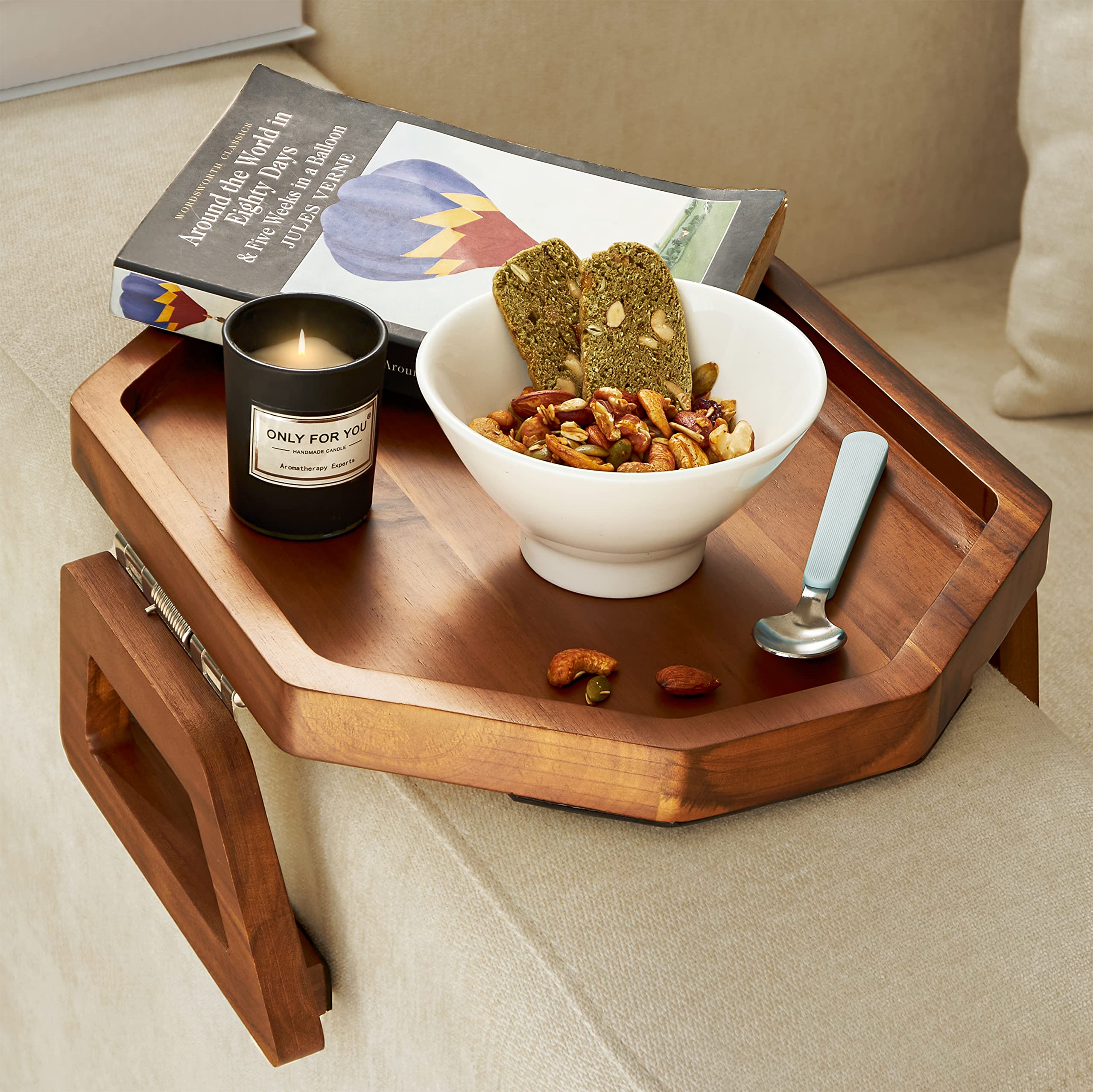 Tinamo octagonal acacia sofa arm tray close-up shows durable wood and elegant grain.