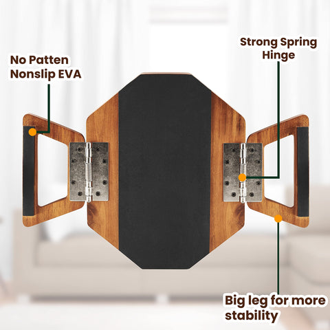 Tinamo octagonal acacia sofa arm tray with spring hinges demonstrates secure grip on arm.