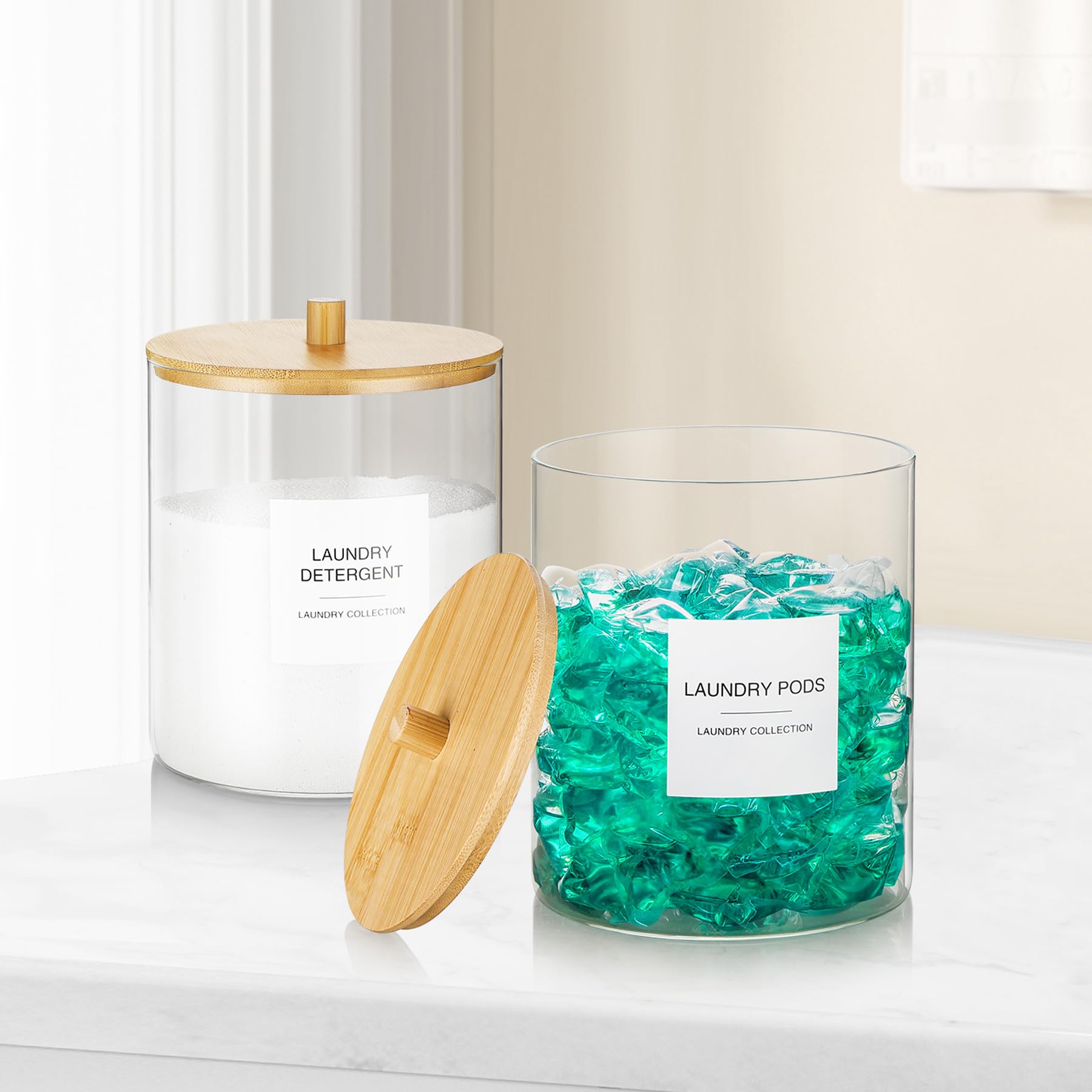 TIPGO laundry room setup featuring two labeled jars and chic decor