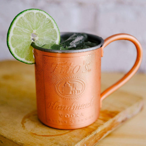 Tito's copper mug interior shows stainless steel liner for durable, tarnish-resistant serving.